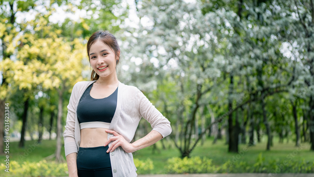 Portrait of young woman in fitness wear exercising in park. Healthy Concept, copy space. Portrait of young woman in fitness wear exercising in park. Healthy Concept, copy space.