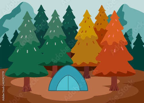 Blue camping tent in the forest behind the mountains