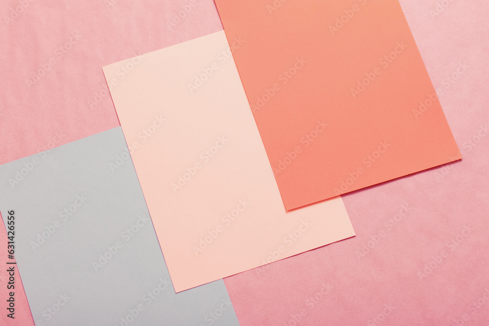 multi-colored paper background from several sheets of cardboard