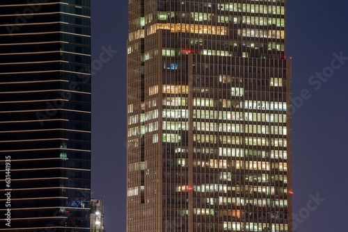Business office windows at night Corporate building Ho Chi Minh City Vietnam