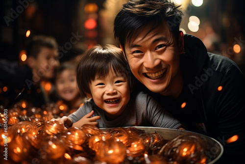 Portrait of Asian man and son
