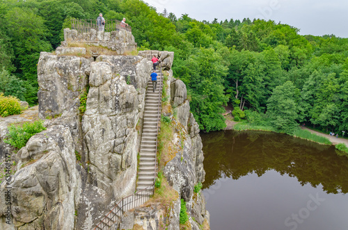 People on a rock, Externsteine, Germany 