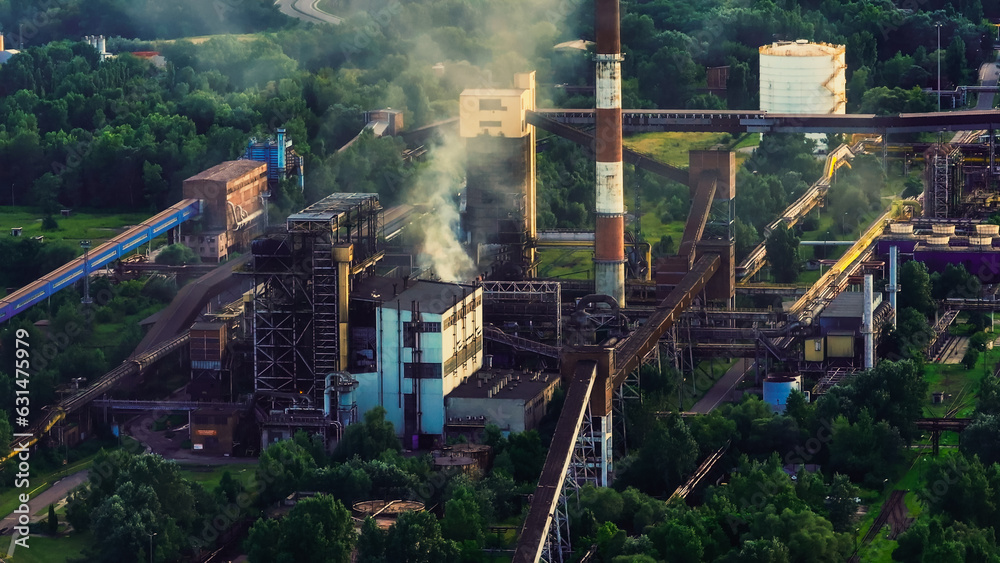 Smog and pollution concept and global warming concept, coal fired power station power plant. Damage power station. Short circuit at the transformer at high voltage substation and a lot of fire. 