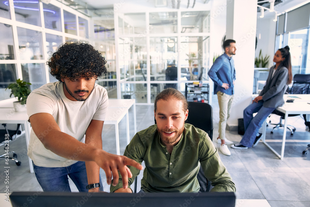 Successful hipster team in coworking. Freelancers. Successful hipster team in coworking. Freelancers.
