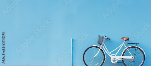 Wallpaper Mural A high-quality photo of a bicycle is positioned against a blue wall, with empty space available Torontodigital.ca