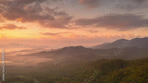 Wallpaper Mural Hyperlapse Video (4K), Beautiful aerial view of a mountain with the sun shining golden, Baan Pang Puai, Mae Moh, Lampang, Thailand.	 Torontodigital.ca