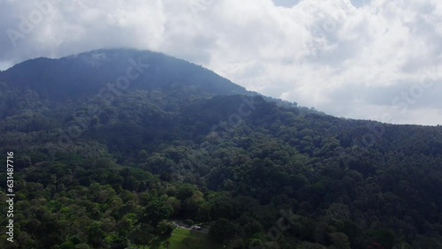 Breathtaking 4K Aerial View of Tropical Jungle and Majestic Mountain Peaks with Clouds, Shot on DJI Air 2S Drone - Nature, and Outdoor Adventure Cinematic Landscape