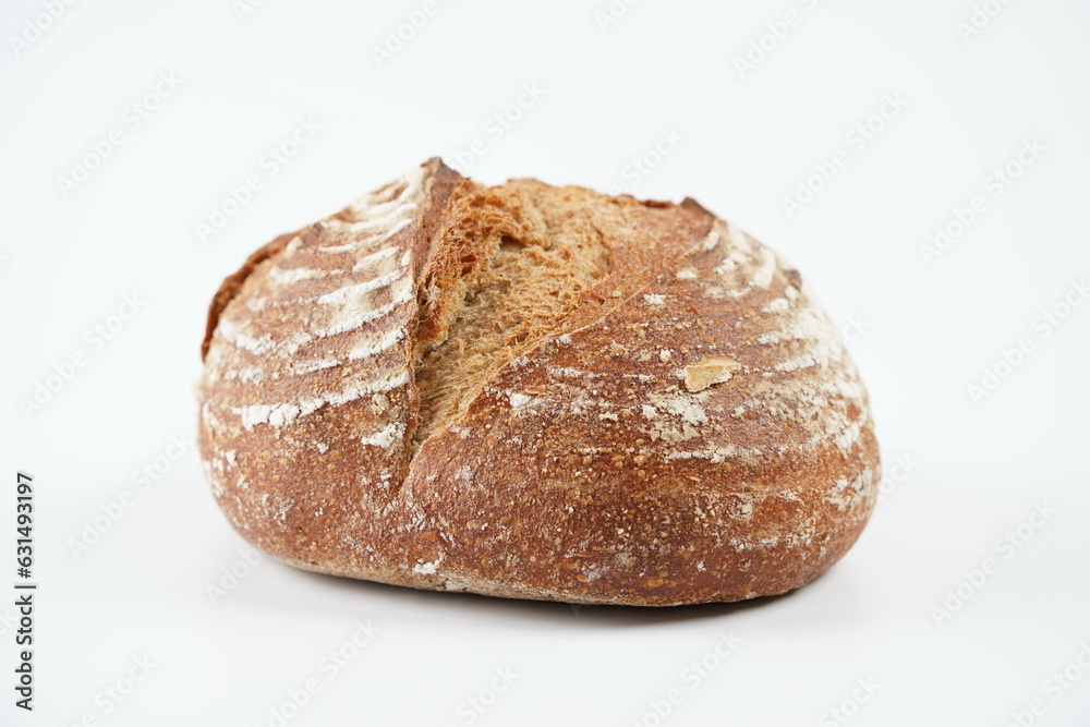 Fresh rye bread or whole grain bread. Healthy baked bread with crispy crust Fresh rye bread or whole grain bread. Healthy baked bread with crispy crust