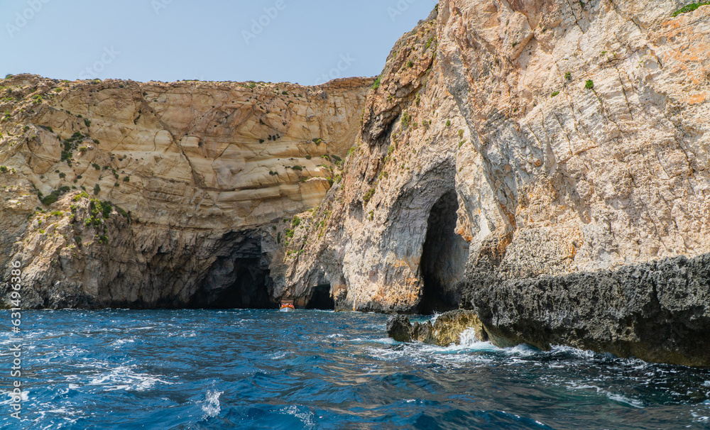 along the coast at the Blue Grotto in Malta