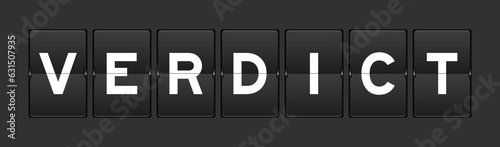 Black color analog flip board with word verdict on gray background