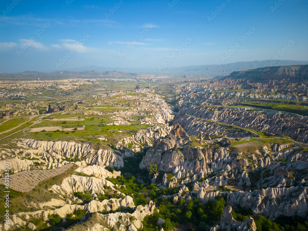 Hot air balloons in Goreme Historic National Park in Cappadocia, Central Anatolia, Nevsehir Province, Turkey. Goreme Historic National Park is a UNESCO World Heritage Site since 1985. 