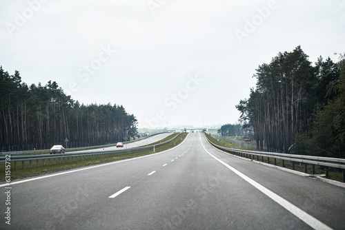 New A1 highway in Poland. The autostrada A1, officially named Amber Highway. View from the car on a road. © AlexGo