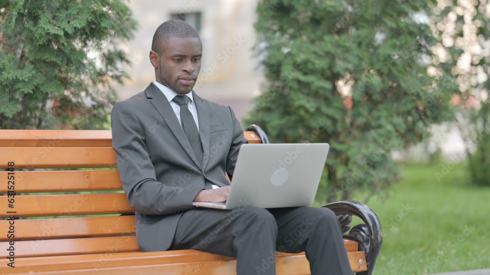 African Businessman Working on Laptop Outdoor African Businessman Working on Laptop Outdoor