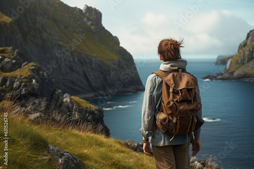 Woman with backpack hiking on island, aesthetic look