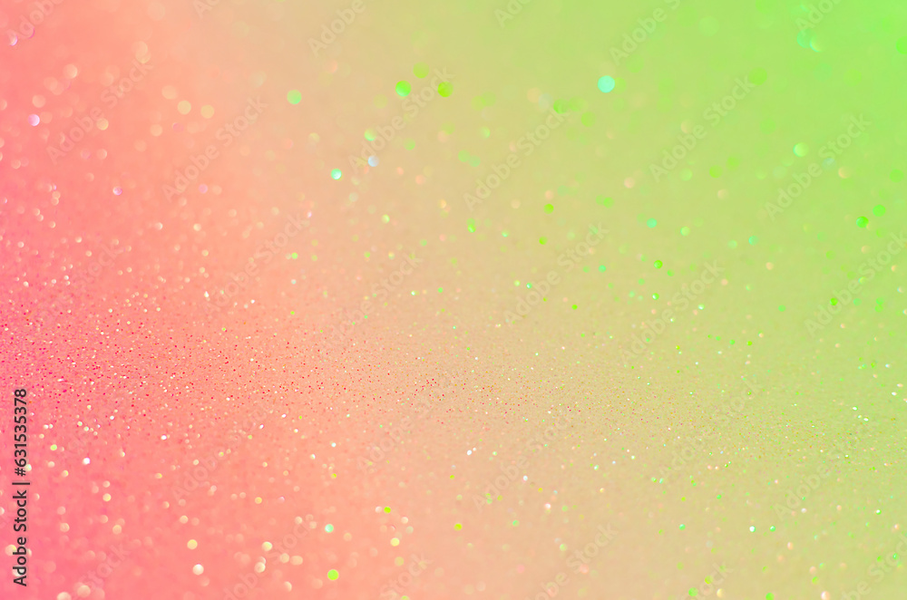 Blurred small sparkles form a background in two colors.