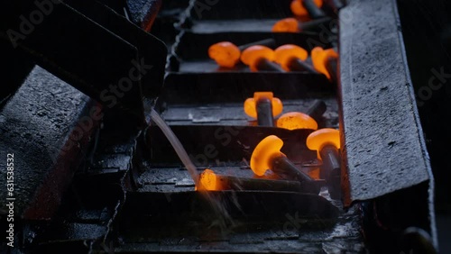 Heated Screws Falling onto Production Line in Screw Factory