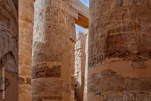 Shot of the detail of the columns with closed papyriform capitals in Karnak temple, Egypt photo