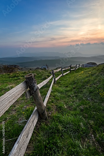 Fence in the pastures of malga Pidocchio. Erbezzo, Lessinia, Veneto, Italy. photo