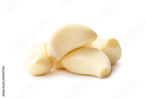Fresh beautiful whole peeled garlic cloves in stack isolated on white background with clipping path.