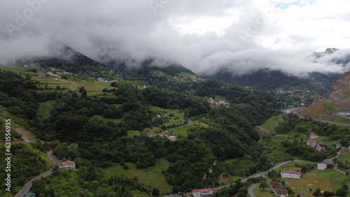 Turkish village nestled near Trabzon, adorned with lush green valleys, abundant trees, and untouched nature