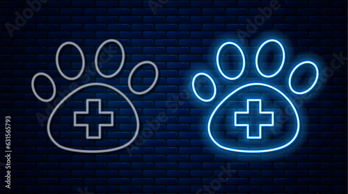 Glowing neon line Veterinary clinic symbol icon isolated on brick wall background. Cross hospital sign. A stylized paw print dog or cat. Pet First Aid sign. Vector