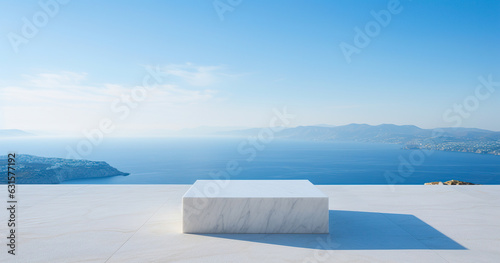 Marble podium with defocused views of the sea in the background. Copy space photo