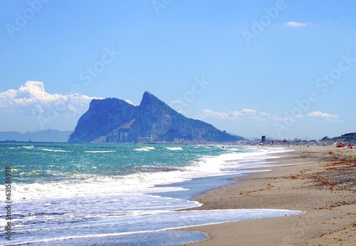 view along the beach at the Mediterranean Beach with a view towards the Rock of Gibraltar and La L  nea de la Concepci  n  Playa de la Hacienda  Andalusia  Malaga  Spain