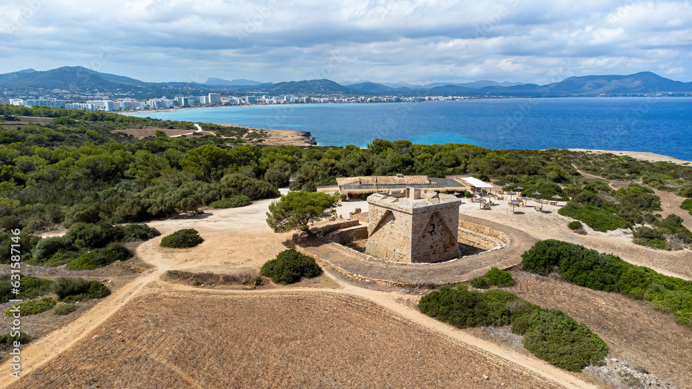 Castle of the Punta de N'Amer, a medieval defensive tower in a protected natural area located on a peninsula between Sa Coma and Cala Millor on the coast of Majorca in the Balearic Islands, Spain