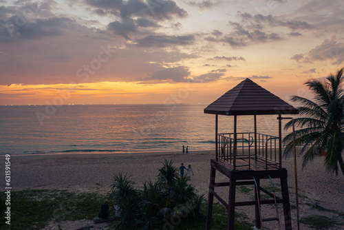 sunset at Karon beach.Karon beach is a beach is broad and long. Sand and beautiful beach suitable for swimming and used as a training dive..Karon beach have many kind of water sports © Narong Niemhom