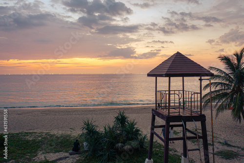 sunset at Karon beach.Karon beach is a beach is broad and long. Sand and beautiful beach suitable for swimming and used as a training dive..Karon beach have many kind of water sports