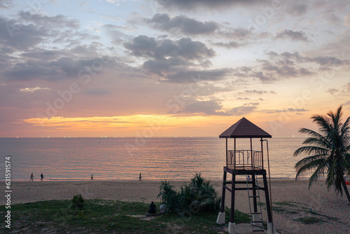 sunset at Karon beach.Karon beach is a beach is broad and long. Sand and beautiful beach suitable for swimming and used as a training dive..Karon beach have many kind of water sports