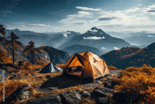 Tourism concept. Tourist tent camping in summer mountains near the lake
