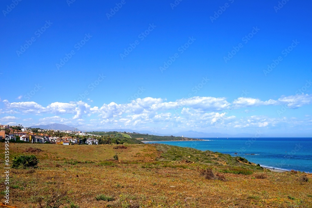 view towards the beautiful village La Alcaidesa and the beach at the Mediterranean Sea, Cádiz, Andalusia, Malaga, Spain