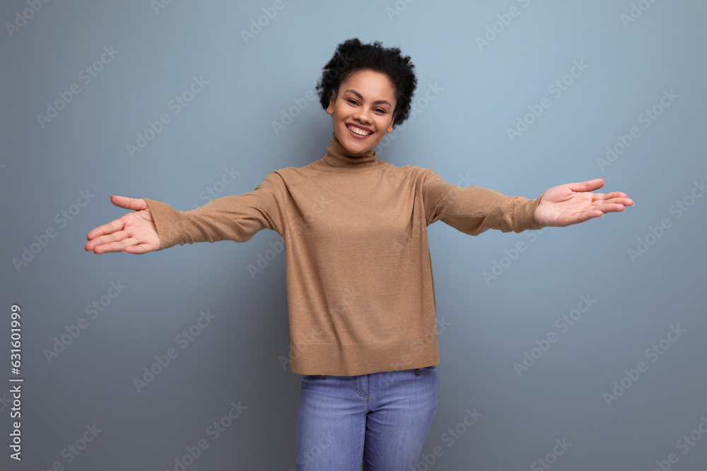 isolated with background, attractive pretty young brunette hispanic woman with ponytail in casual sweater isolated with background, attractive pretty young brunette hispanic woman with ponytail in casual sweater
