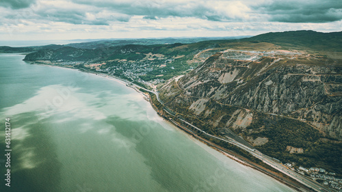 Aerial view of a little town surrounded by beautiful nature Llanfairfechan, North Wales, Cymru, UK