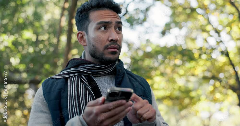 Man, hiking and smartphone, lost and navigation with digital map, nature walk in forest during winter and travel. Adventure, trekking and search location, male person using phone and direction on app Man, hiking and smartphone, lost and navigation with digital map, nature walk in forest during winter and travel. Adventure, trekking and search location, male person using phone and direction on app
