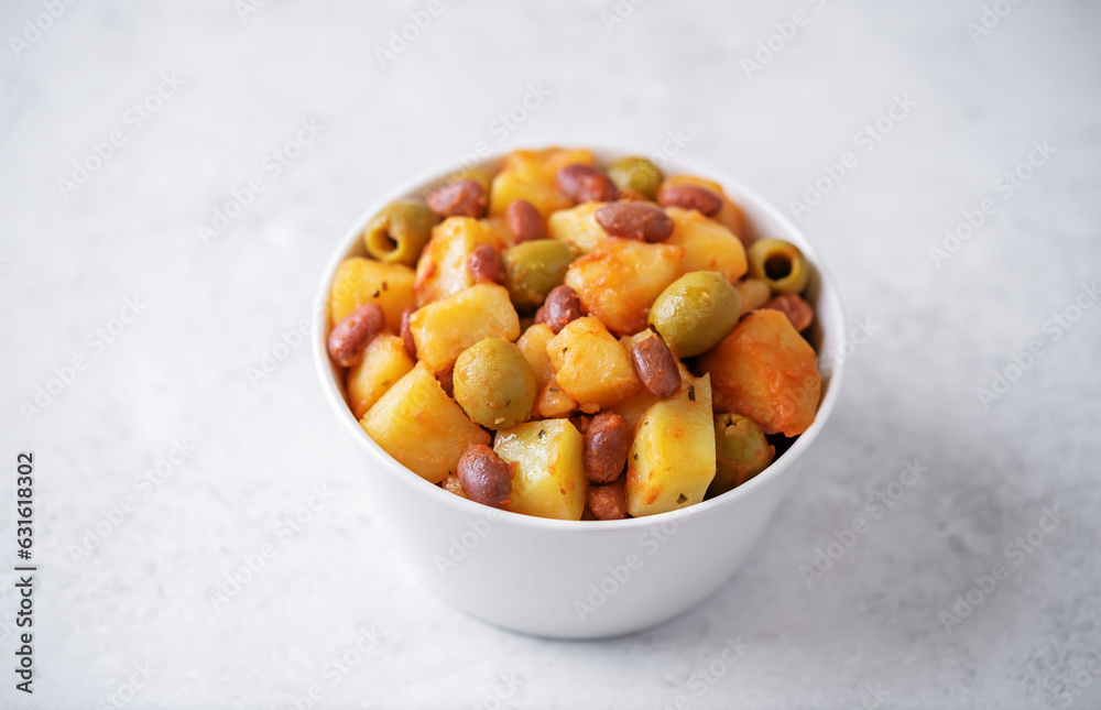 Puerto Rican traditional potato red kidney bean stew in a bowl Puerto Rican traditional potato red kidney bean stew in a bowl