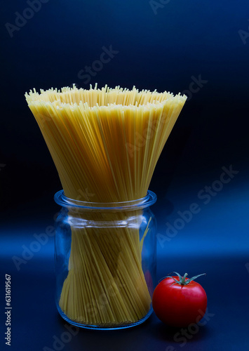 Obraz na płótnie spaghetti standing in a trasparent glass