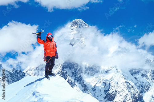 Triumphant Climber Conquers Nepal's Majestic Mountain Peak. Everest Region