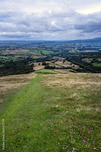 View from Bryn Teg ridge on a cloudy summer afternoon in the Brecon Beacon or Bannau Brycheiniog national park, Powys, Wales photo