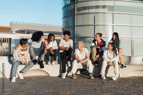 Group of young generation z friends hanging out together in the city 
