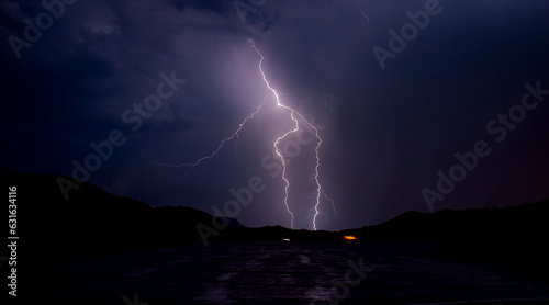 Fotografie, Obraz Lightning bolts striking at Lake Mead Nevada