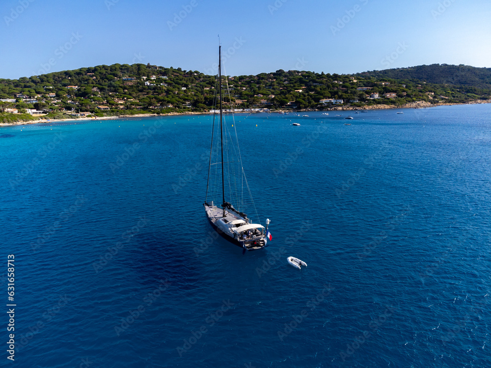 Summer holidays on French Riviera, aerial view on rocks and sandy beach Escalet with crystal clear blue water near Ramatuelle and Saint-Tropez, France Summer holidays on French Riviera, aerial view on rocks and sandy beach Escalet with crystal clear blue water near Ramatuelle and Saint-Tropez, France