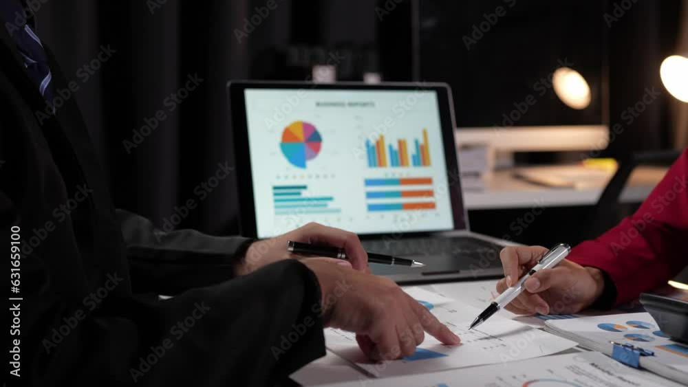 Business People Meeting to analyze and discuss and brainstorm the financial report chart data in the office Financial advisor teamwork and accounting concept.	