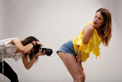 Young women seize themselves; no male meddling photo