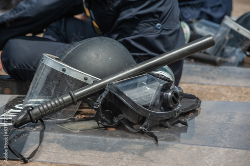 Riot police control the crowd.. photo