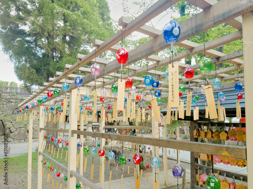 Colorful wind chimes swaying in the wind
