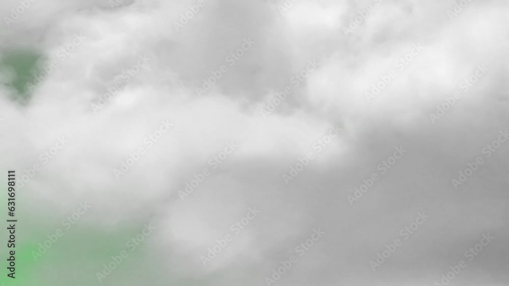 Three irregular moving clouds with a green screen. 4k video quality