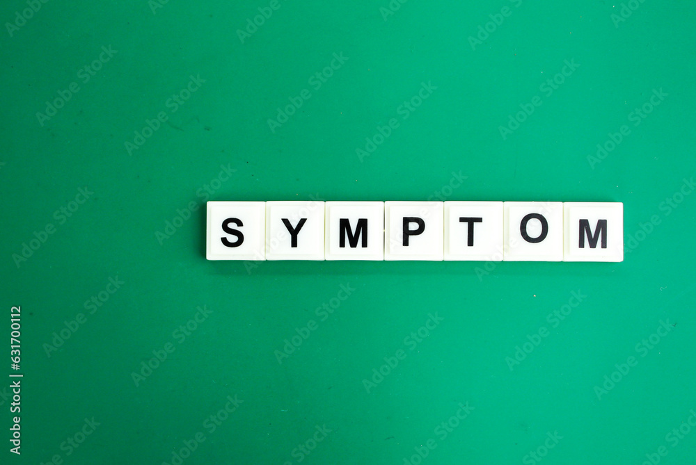 stethoscope and letters of the alphabet with the word Symptom. medical and health concepts stethoscope and letters of the alphabet with the word Symptom. medical and health concepts