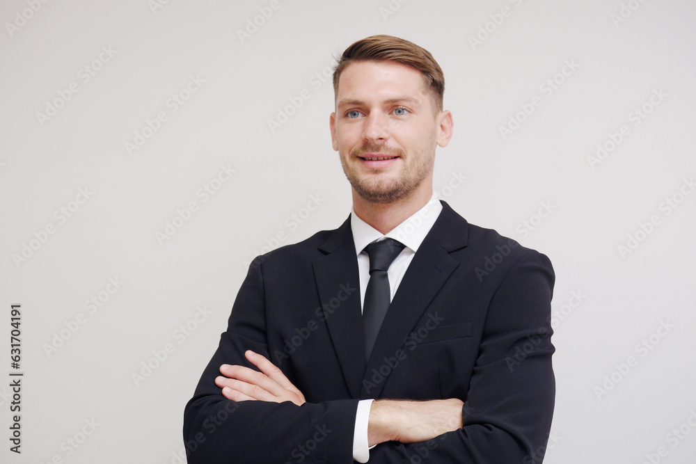 Young smiling businessman in suit on white background. Young smiling businessman in suit on white background.